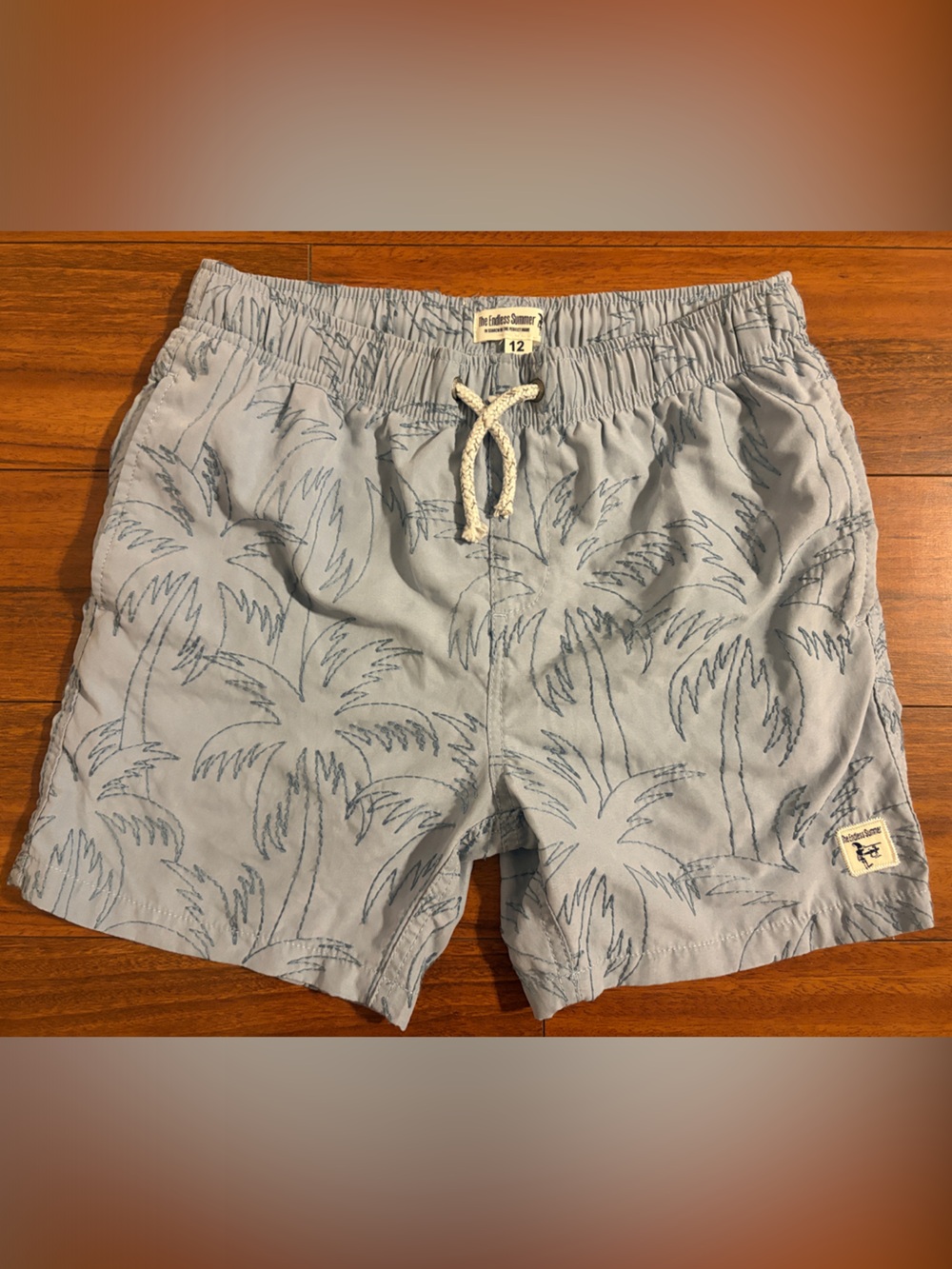 Endless Summer Kids Light Blue Palm-Print Swim Trunks with Drawstring